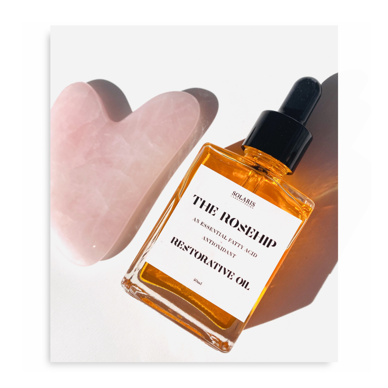 Gua Sha + Rosehip oil